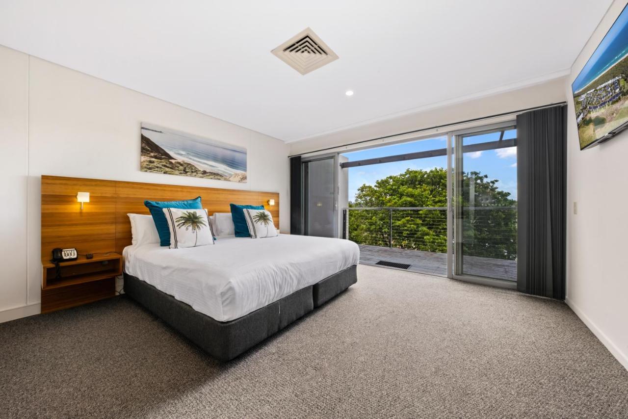 منتجع بولمان ماجينتا شورز المدخل المظهر الخارجي الصورة A bedroom at the hotel