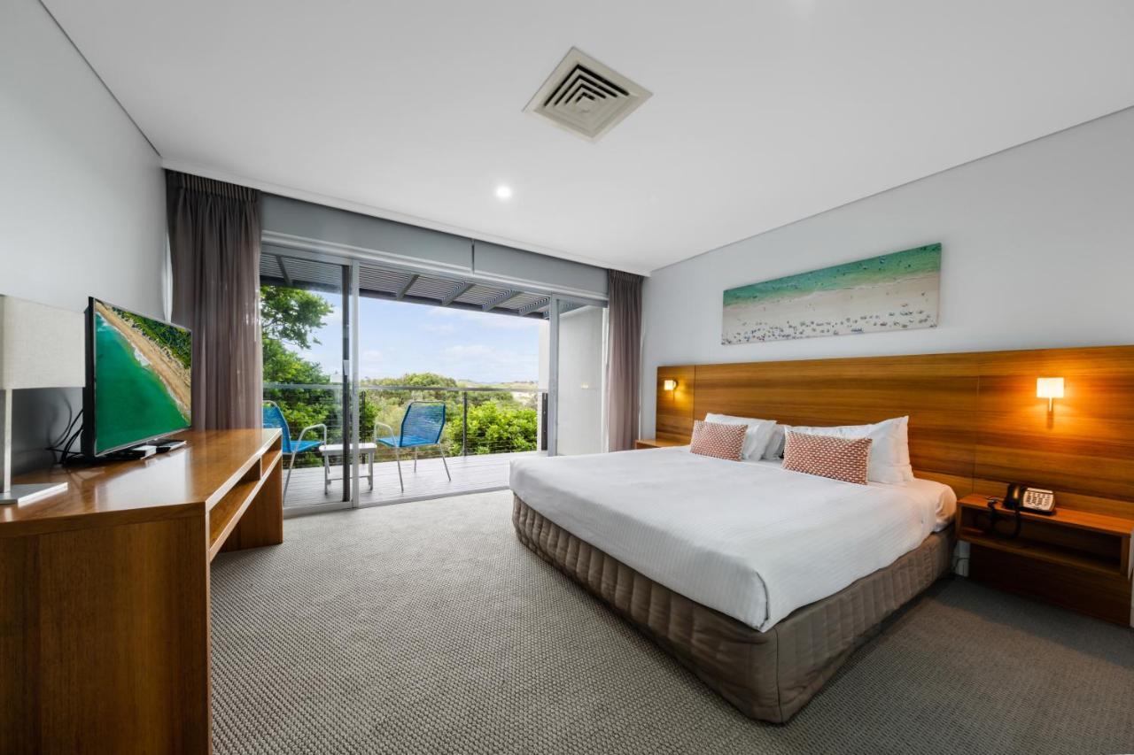 منتجع بولمان ماجينتا شورز المدخل المظهر الخارجي الصورة A bedroom at the Mantra on Saltwater Island
